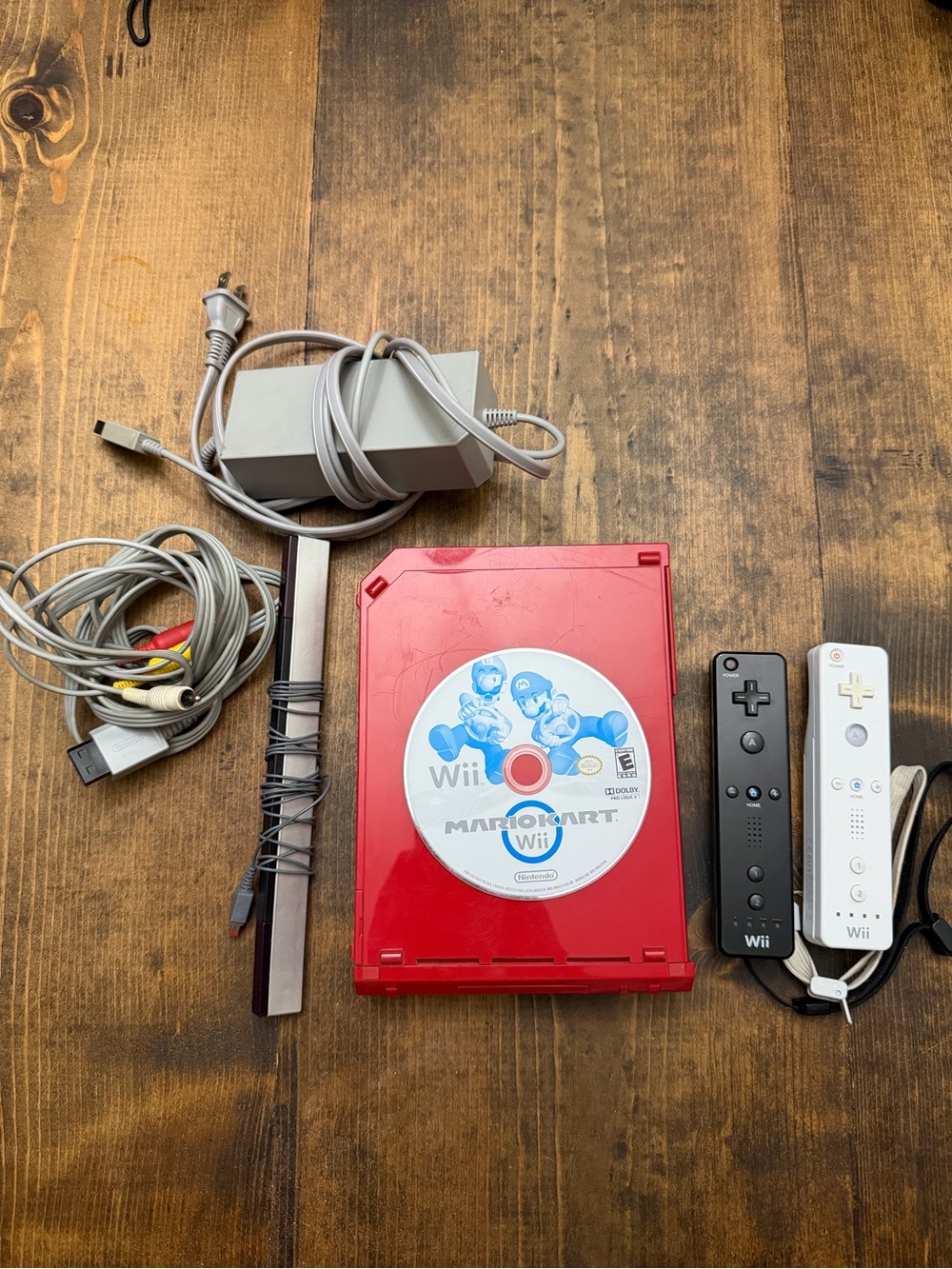 Nintendo Wii Red Console Bundle with Mario Kart Disc and Remotes